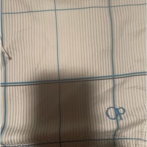 Blue and white strip swim shorts has tie and Velcro and pockets